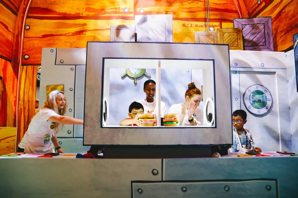 fry cook games competition experiential design nickelodeon booth comic con human connection