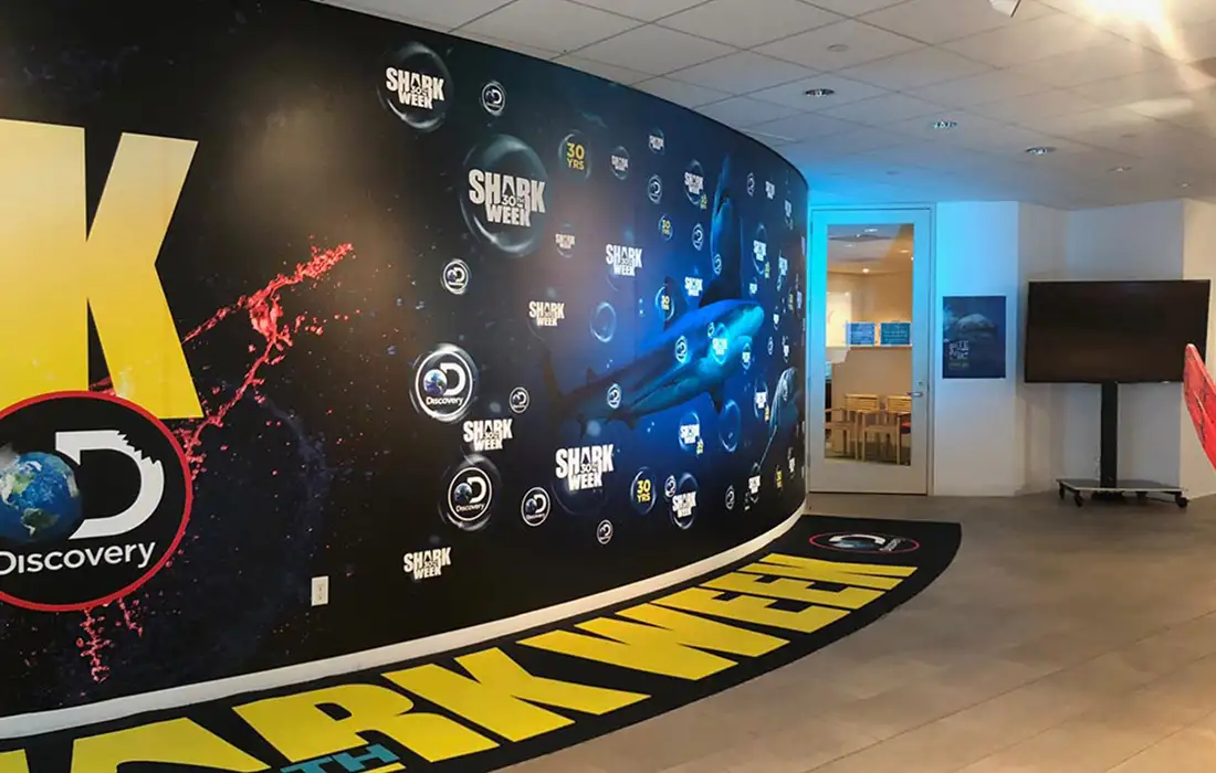 Discovery-Shark-Week_Paley-Center-2019-black-wall-Glow-Exhibitions-Events-Experiences